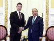 越南国家主席阮春福会见越南驻瑞士名誉领事菲利普·罗斯勒