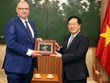 越南政府常务副总理范平明会见丹麦大使