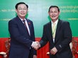 越南国会主席王廷惠访问柬埔寨磅同省