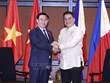 越南国会主席王廷惠与菲律宾参议院议长胡安·祖比里举行会谈