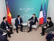 越南政府范明政会见法国总统马克龙