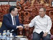 国会主席王廷惠与老挝前高层领导人举行会晤