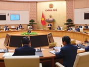 越南政府总理范明政主持召开2月政府例行会议