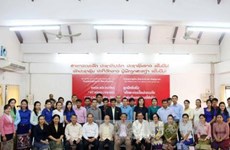 越南协助老挝提高新闻工作者业务水平