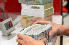 越南国家银行上调越盾对美元汇率