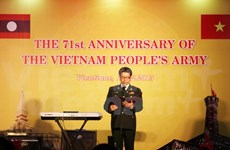 越南人民军建军71周年纪念典礼在老挝举行