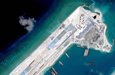 国际舆论对中国在长沙群岛非法建设的机场进行校验试飞表示担忧