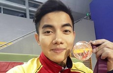 体操世界杯卡塔尔站：越南运动员范福兴摘铜