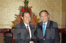胡志明市委副书记会见老挝赛宋奔省工作代表团