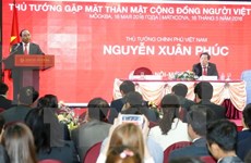 越南政府总理阮春福会见旅俄越南人社群代表