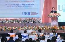 越南国家主席陈大光出席胡志明市经济大学建校40周年纪念典礼