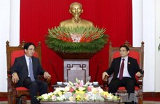 越共中央组织部部长范明正会见中国驻越大使洪小勇