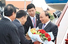 越南政府总理阮春福启程出席暹粒省召开的第三届湄公河委员会峰会（组图）