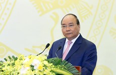 越南政府总理阮春福出席越南外国非政府组织工作委员会21年工作总结会议（组图）