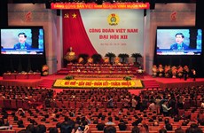 越共中央总书记阮富仲等党和国家领导出席越南工会第十二届全国代表大会全体会议（组图）