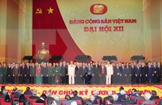 越共十二大：老挝友人和旅老越南人社群喜庆越共十二大成功召开