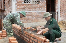 越南全国人民着力实现可持续扶贫 推进新农村建设