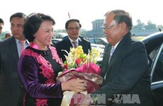 越南国会主席阮氏金银会见老挝人民革命党中央委员会总书记、国家主席本扬•沃拉吉    