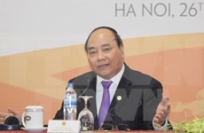 越南政府总理阮春福在河内举行国际新闻发布会