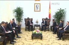 越南政府副总理郑廷勇会见美国艾克森美孚集团副董事长