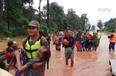 老挝一水电站大坝坍塌  越南领导人为此致慰问电