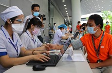 组图：胡志明市有史以来规模最大的新冠疫苗接种计划正式启动