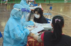 越南新冠疫苗接种速度快于区域内多国