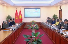 加强越南通讯社与老挝国家通讯社合作