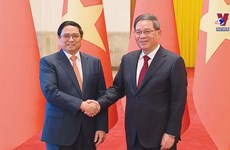 越南政府总理范明政与中国国务院总理李强举行会谈