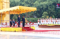 政府总理范明政举行仪式 欢迎德国总理对越南进行正式访问