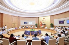 越南政府总理范明政主持召开7月政府例行会议