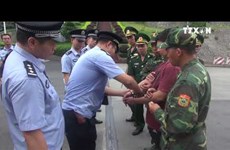 越南警方向中国警方移交4名中国籍通缉在逃犯