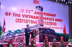 越南人民军建军72周年纪念仪式在老挝举行