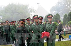 奠边省为在老挝牺牲的越南志愿军遗骨举行追悼会
