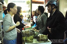 越南春节传统食品吸引老挝消费者的眼球