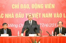 阮春福总理：老挝越南企业在投资经营活动中需保持言行一致