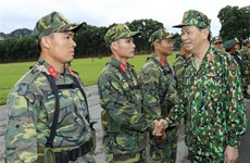 越南国家主席陈大光：越南人民军应不断提升综合力量和战斗力