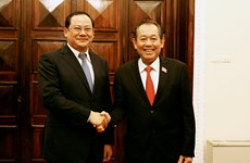越南政府副总理张和平与老挝政府副总理宋赛 • 西潘敦举行会谈