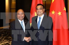 第31届东盟峰会: 越中一致同意推动双边贸易均衡发展