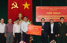 老挝政府协助越南富安省第十二号台风受灾群众开展恢复重建工作