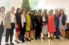 美国妇女代表团对越南《西贡解放报》报社进行工作访问
