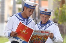 越南国家主席致信祝贺越通社信息报创刊35周年 