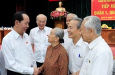 越南国家主席陈大光与胡志明市选民见面交流