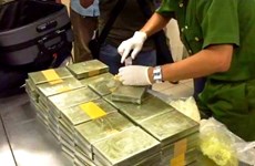 越南公安破获跨境贩毒案 缴获179块海洛因砖