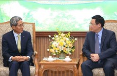 越南政府副总理王廷惠会见韩国国民银行董事长兼首席执行官