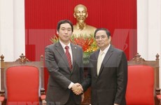 越共中央组织部部长范明正会见日本共产党代表团