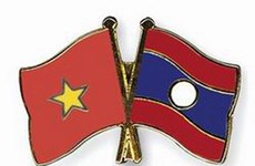 老挝领导人高度评价越老两国党纪律检查机关的合作成果