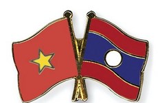 越南领导人致电祝贺老挝人民民主共和国国庆43周年