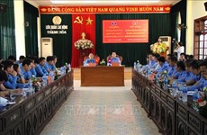 越南清化省与老挝华潘省就工会活动举行经验交流会