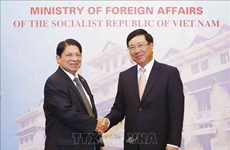 越南政府副总理兼外长范平明与尼加拉瓜外长丹尼斯·孟卡达举行会谈